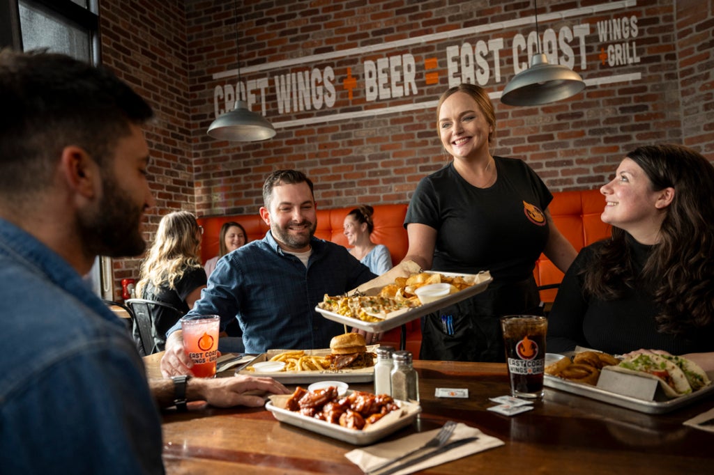 server delivering tables food