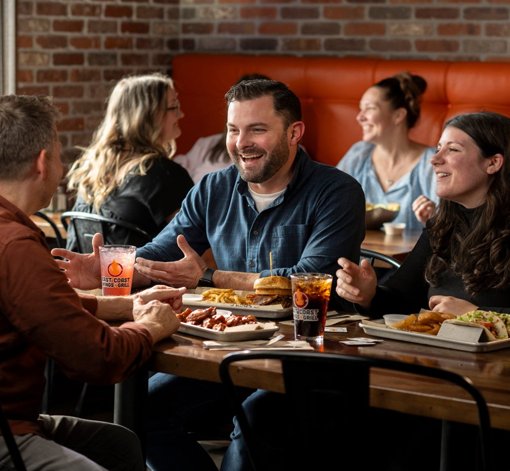 happy family eating dinner at ECW